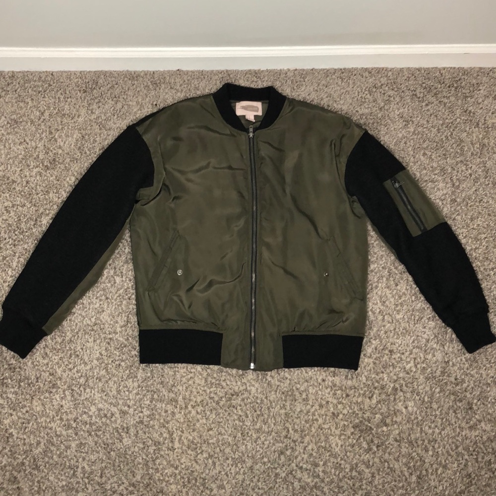 Green and black bomber jacket